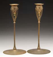 Appraisal: TIFFANY STUDIOS CANDLESTICKS Gilded bronze with leaf ending supports to