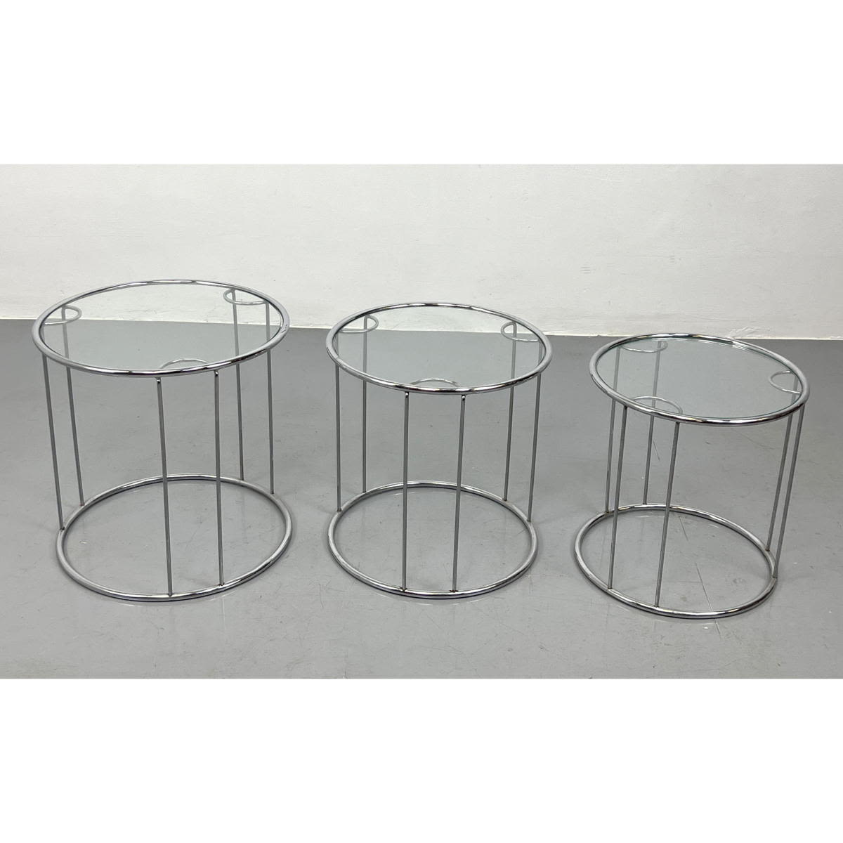 Appraisal: DIA attributed Chrome and Glass Nesting Table Set Design Institute