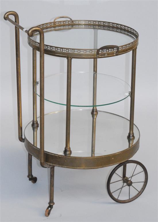 Appraisal: BRONZE AND GLASS TEA CART Three tier with galleried top