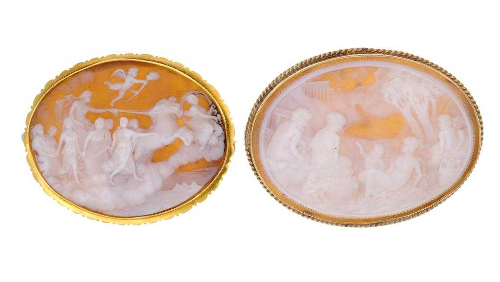 Appraisal: TWO CAMEO BROOCHES each oval shell carved with a classical