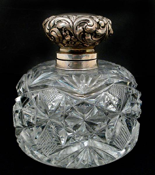 Appraisal: A large cut glass inkwell with chased sterling lid Of