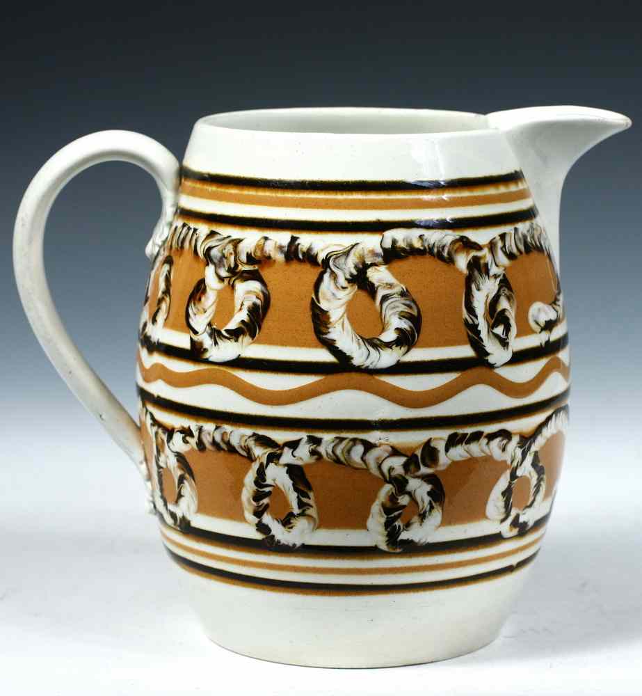 Appraisal: MOCHAWARE PITCHER - Mocha Ware Earthworm Pattern Pitcher '' tall