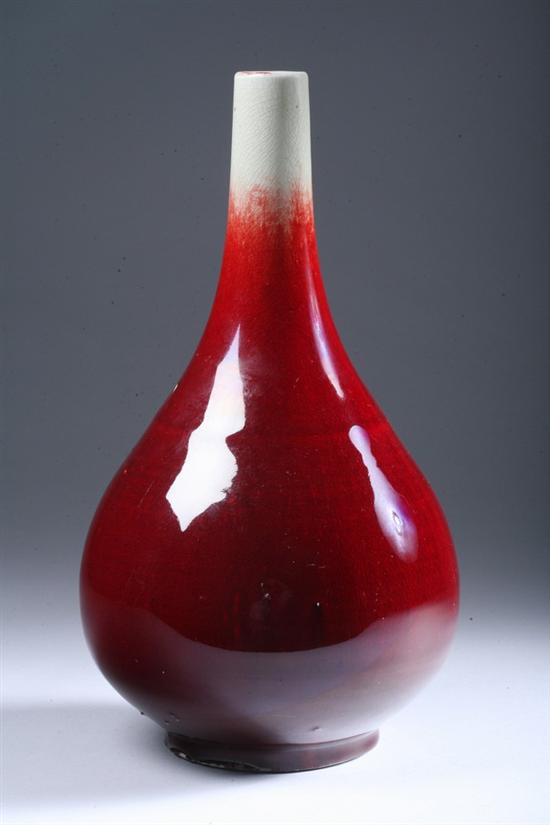 Appraisal: CHINESE COPPER RED PORCELAIN BOTTLE VASE th century Pear-shaped with