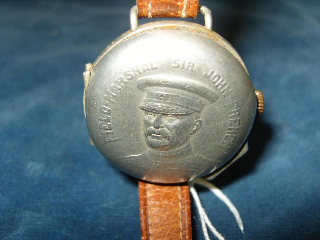 Appraisal: A WWI Trench watch a hunting cased wristlet the cover