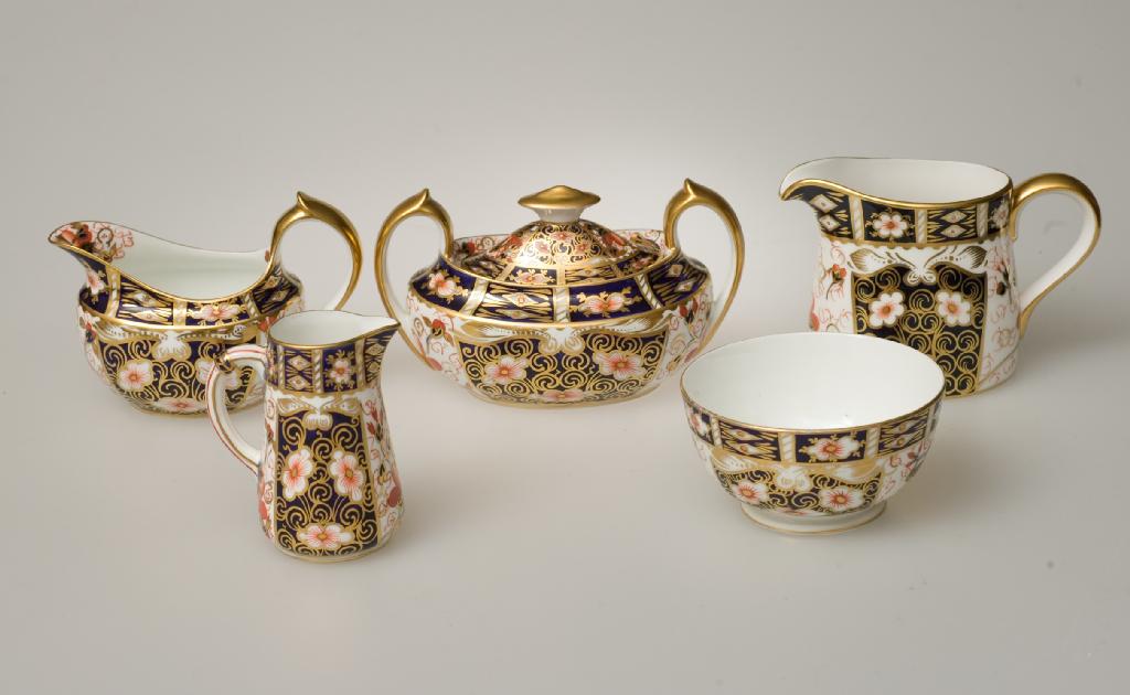 Appraisal: THREE PIECES OF ROYAL CROWN DERBY in the Imari palette