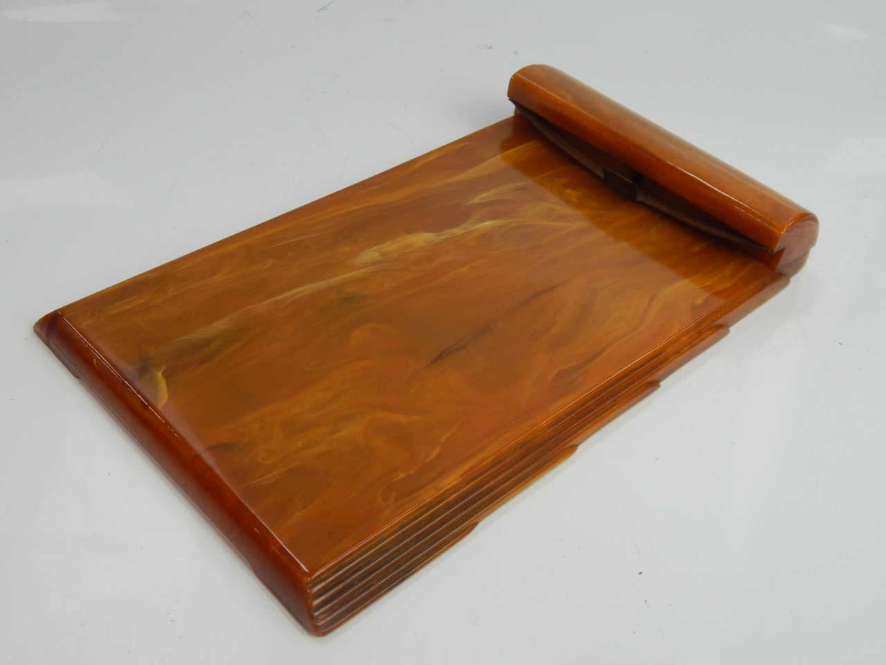 Appraisal: A 's Dickinson Carvacraft amber plastic desk pad holder cm