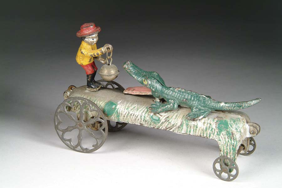 Appraisal: GATOR BAITER BELL TOY Attributed to N N Hill Brass