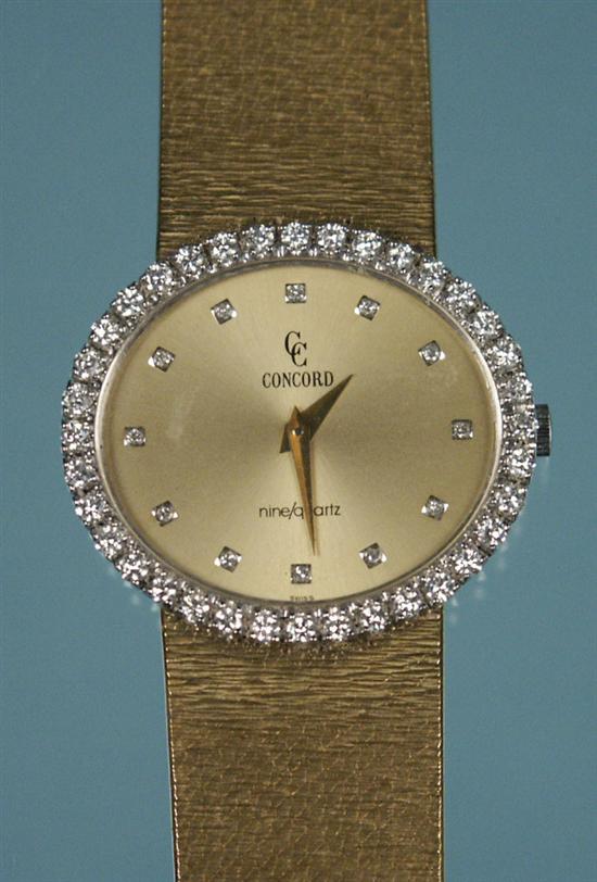 Appraisal: LADIES K YELLOW GOLD AND DIAMOND WATCH Concord Watch Company