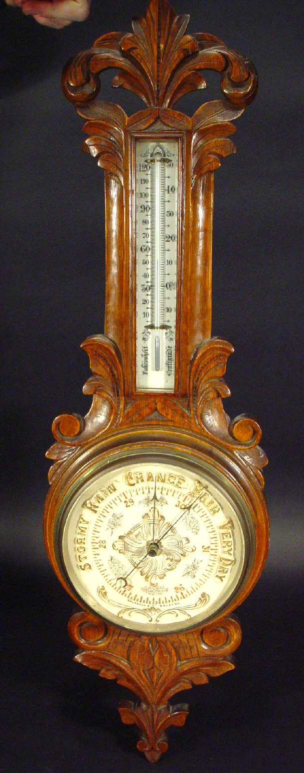 Appraisal: Victorian walnut banjo barometer with acanthus carvings gilded china dial