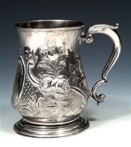 Appraisal: A GEORGE II SILVER BALUSTER SHAPED TANKARD with double 'C'