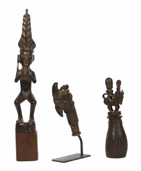 Appraisal: A Group of Three Carved Wood Figures Indonesia Sumatra comprising