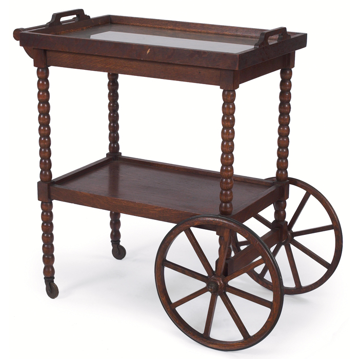 Appraisal: Stickley Brothers tea cart removable glass tray with spool legs