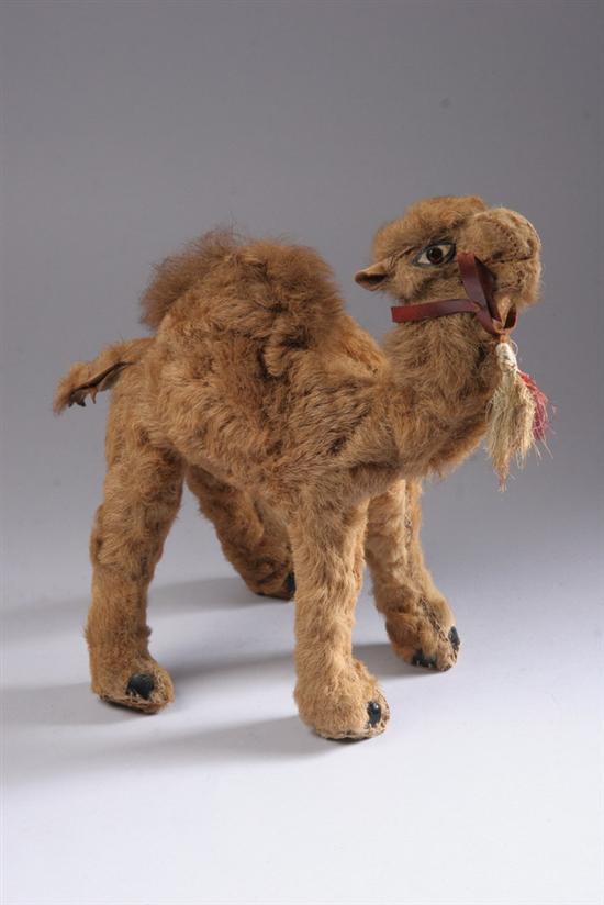 Appraisal: STUFFED MOHAIR CAMEL Circa s With leather hooves fur soles