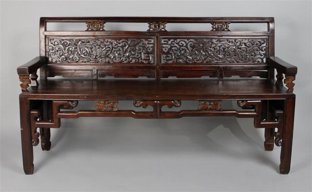 Appraisal: CHINESE EBONIZED HARDWOOD CARVED BENCH of rectangular shape with angular