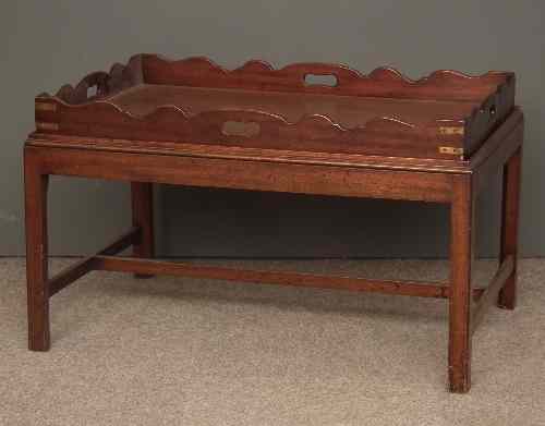 Appraisal: A large mahogany rectangular tray of Georgian design the shaped