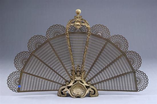 Appraisal: FRENCH STYLE BRASS FAN-FORM FENDER early th century With nine