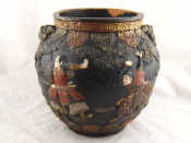 Appraisal: A Japanese low fired ceramic bowl the surface with Samurai