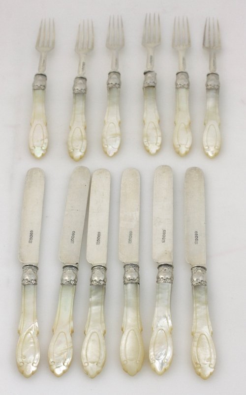 Appraisal: A set of six silver dessert knives and six dessert