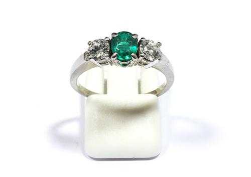 Appraisal: EMERALD AND DIAMOND RING BALTENSPERGER White gold Elegant ring the