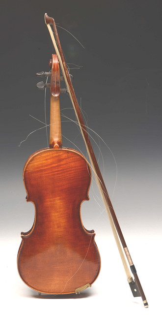 Appraisal: A GERMANY SIZE CHILDS VIOLIN with a label for Neuner