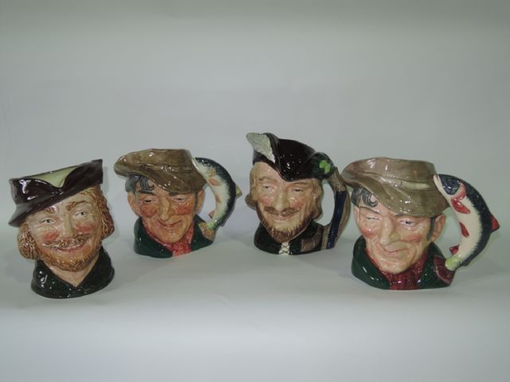 Appraisal: A collection of four large Royal Doulton Character Jugs -