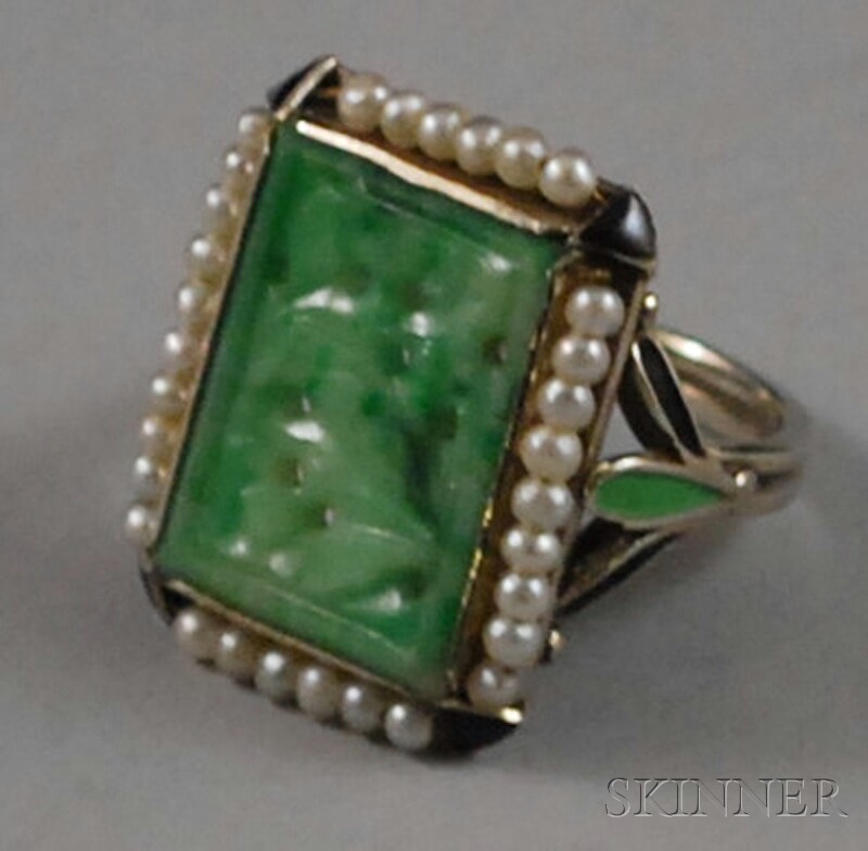 Appraisal: kt White Gold and Carved Jade Ring the pierced jade