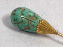 Appraisal: A Russian gold hat pin set with matrix turquoise hallmarks