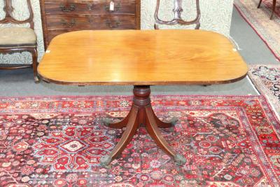 Appraisal: A mid th Century mahogany rectangular breakfast table on a