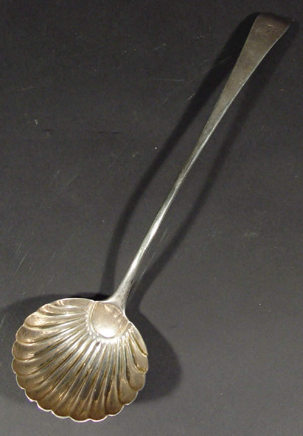 Appraisal: Georgian silver ladle with shell shaped bowl London cm in