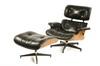 Appraisal: CHAIR AND OTTOMAN - Charles Eames laminated swivel arm chair