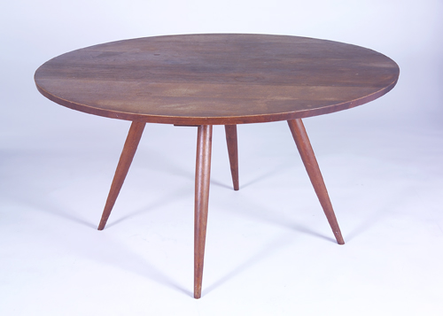 Appraisal: GEORGE NAKASHIMA Dining table with circular top on flared dowel-leg