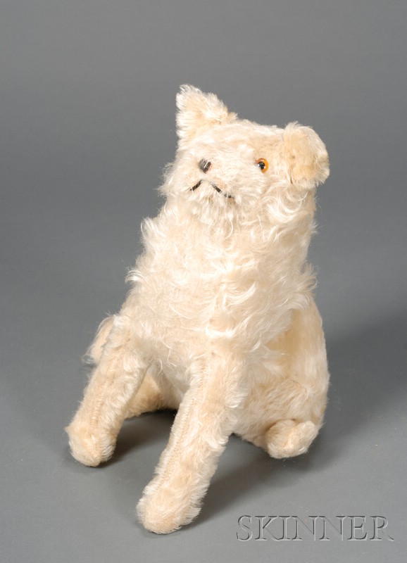 Appraisal: Cream-colored Mohair Sitting Dog c s amber glass eyes one