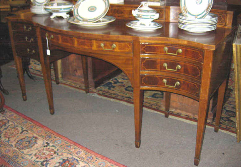 Appraisal: BAKER FEDERAL STYLE MAHOGANY SIDEBOARD Serpentine fronted case with a