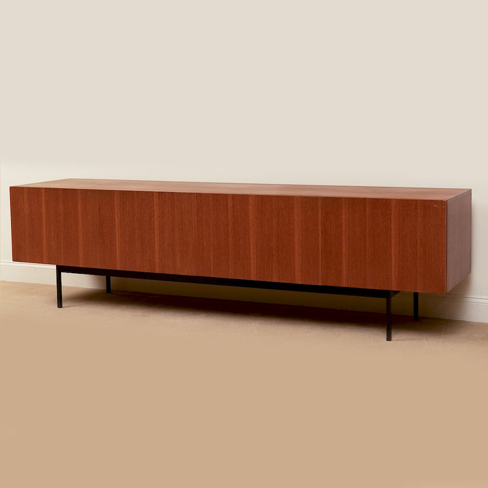 Appraisal: Dieter Waeckerlin Metal-Mounted Teak Credenza for Behr Fitted interior with