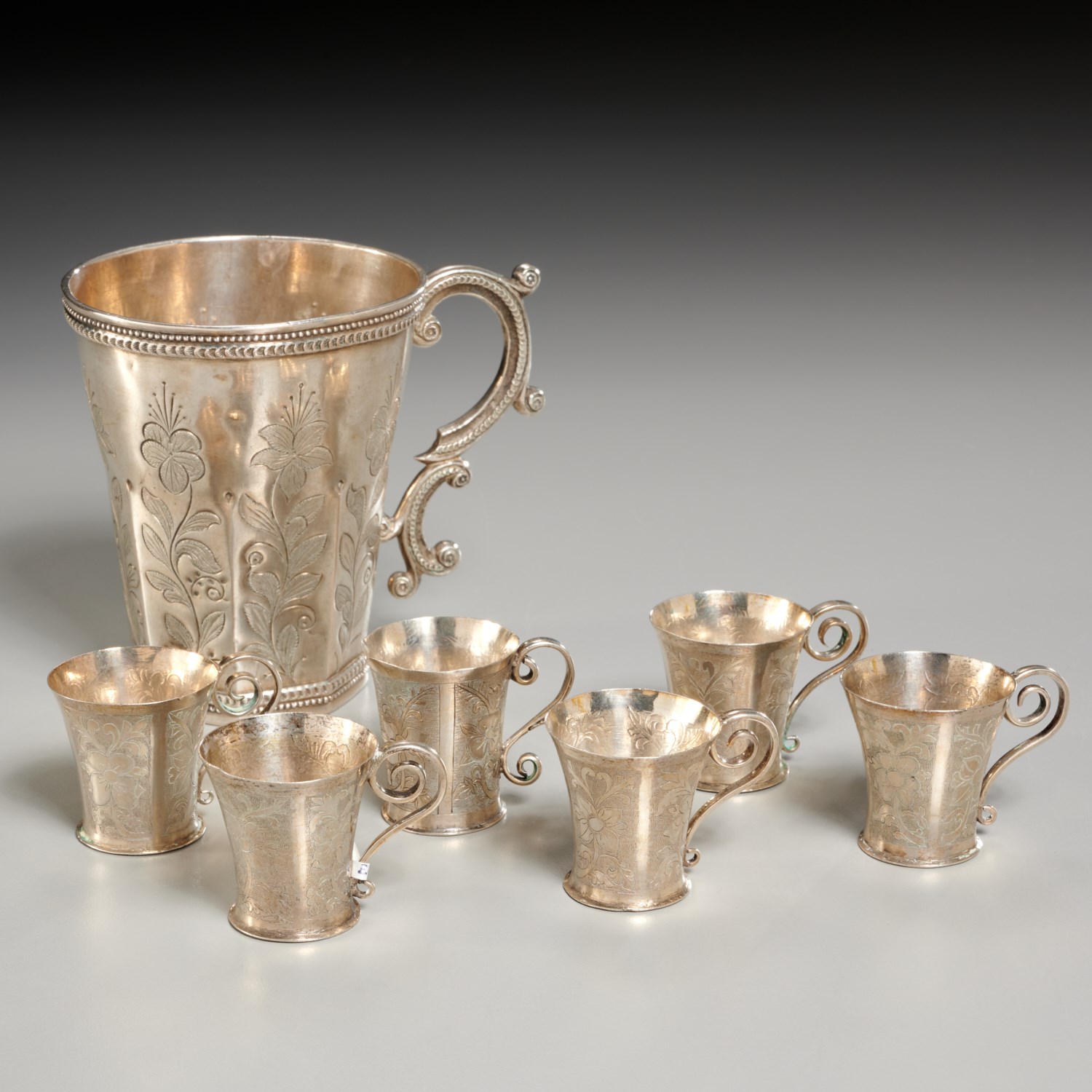 Appraisal: SPANISH COLONIAL ENGRAVED SILVER CUP GROUPING Likely th c incl