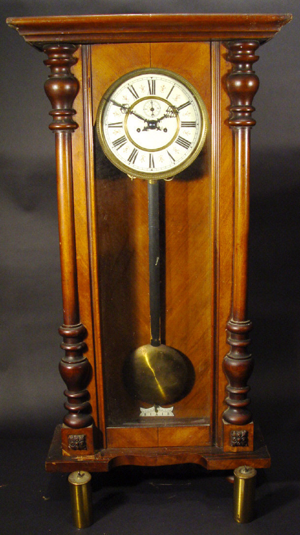 Appraisal: Victorian walnut cased Vienna regulator the movement striking on a