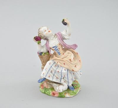 Appraisal: A Royal Vienna Porcelain Figurine of a Young Woman Seated