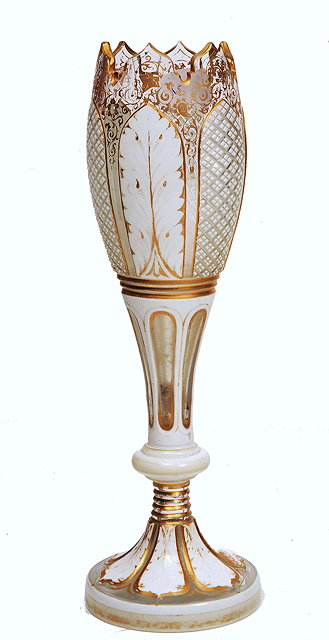 Appraisal: A BOHEMIAN CLEAR AND WHITE OVERLAID GLASS VASE cut arched