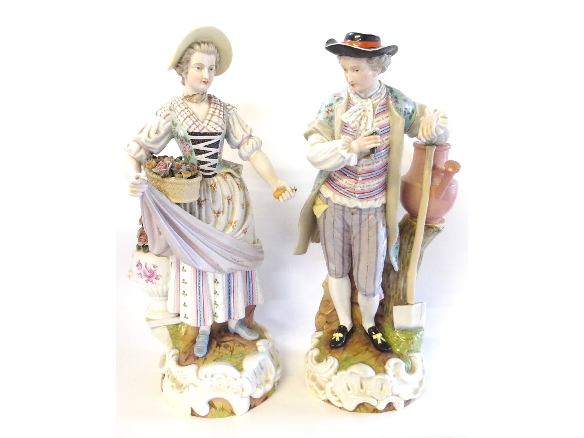 Appraisal: Two Continental porcelain figures of a lady and gentleman some