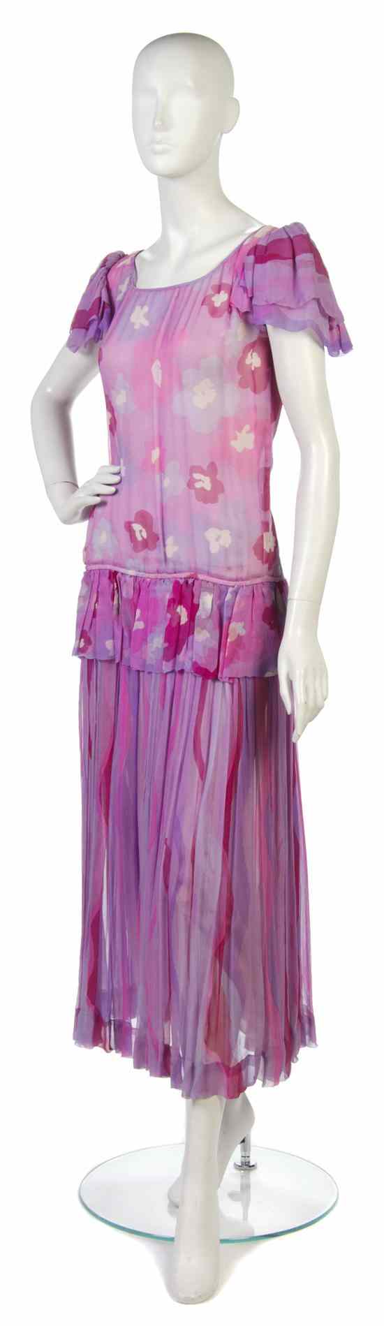 Appraisal: An Yves Saint Laurent Floral Silk Chiffon Dress with ruffle