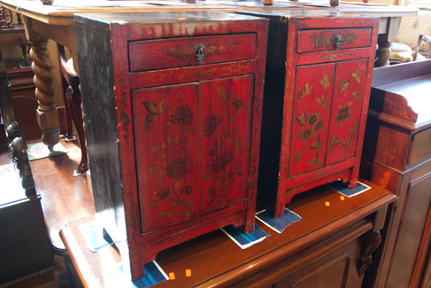 Appraisal: PAIR OF RED ORIENTAL BEDSIDE CABINETS