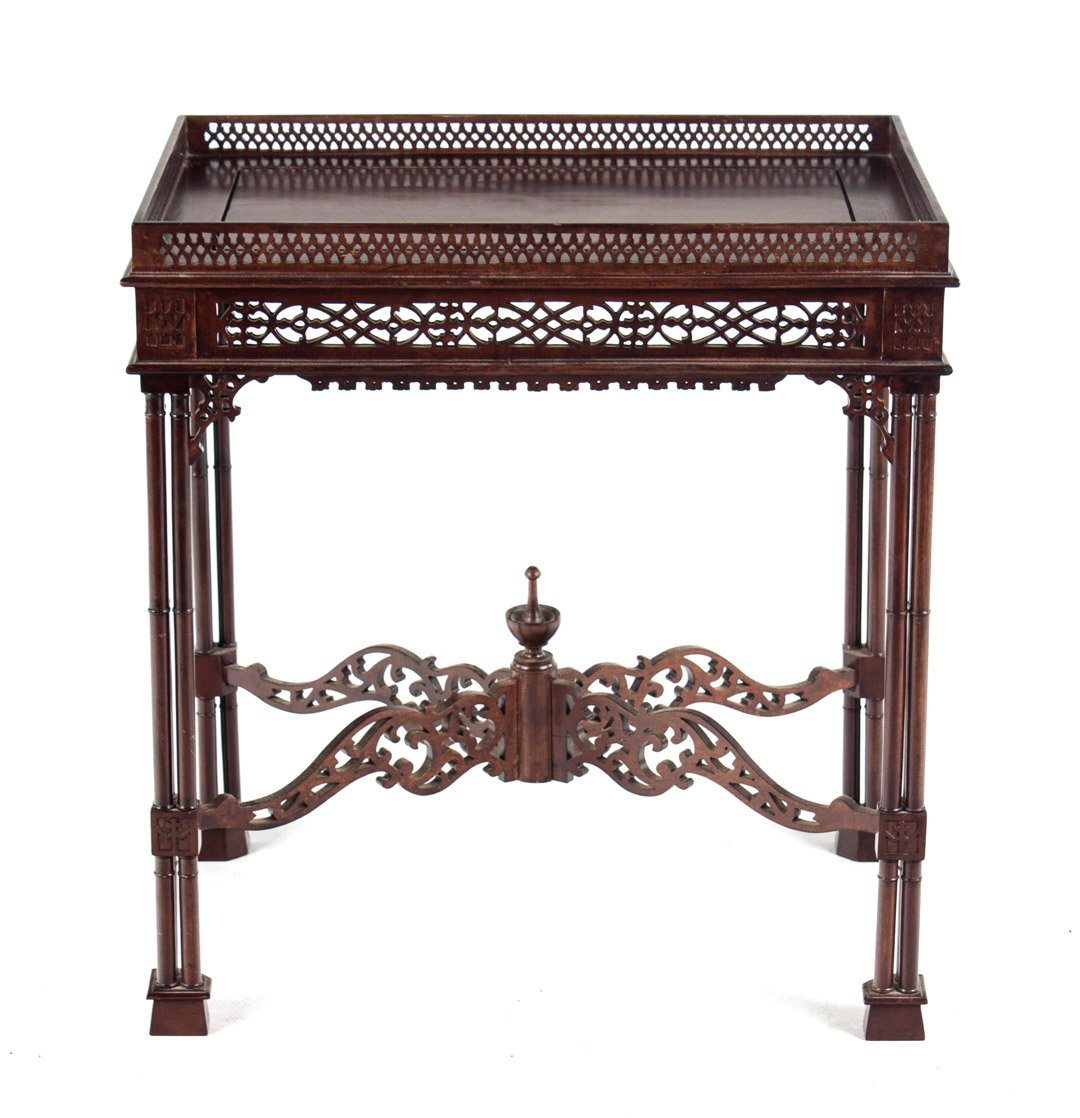 Appraisal: Gothic Chippendale style silver table mahogany table with reticulated gallery