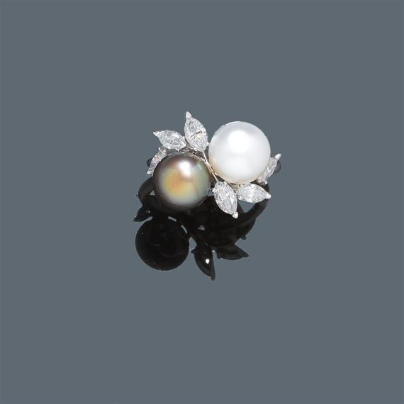 Appraisal: NATURAL PEARL AND DIAMOND RING White gold Classic-elegant Crossover ring