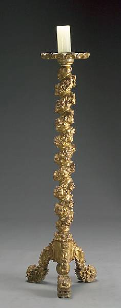 Appraisal: An Italian Rococo giltwood grotto torchere late th century The