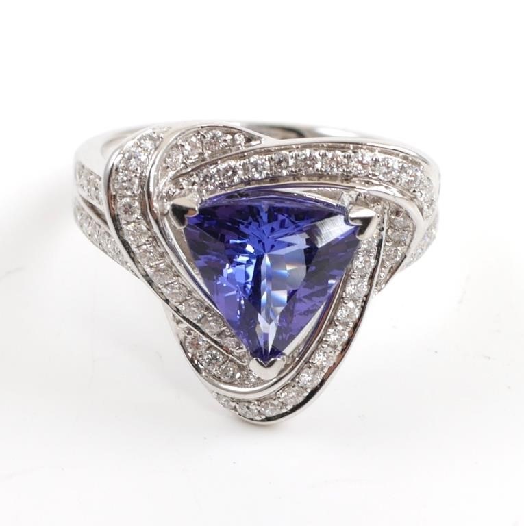 Appraisal: Fourteen karat white gold tanzanite diamond ring The triangular cut