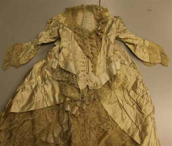 Appraisal: A Victorian cream embroidered silk and lace two piece weding