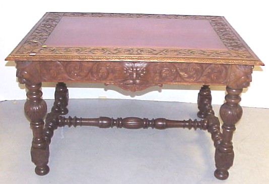 Appraisal: th C carved center table overall scrolled foliate carving centered