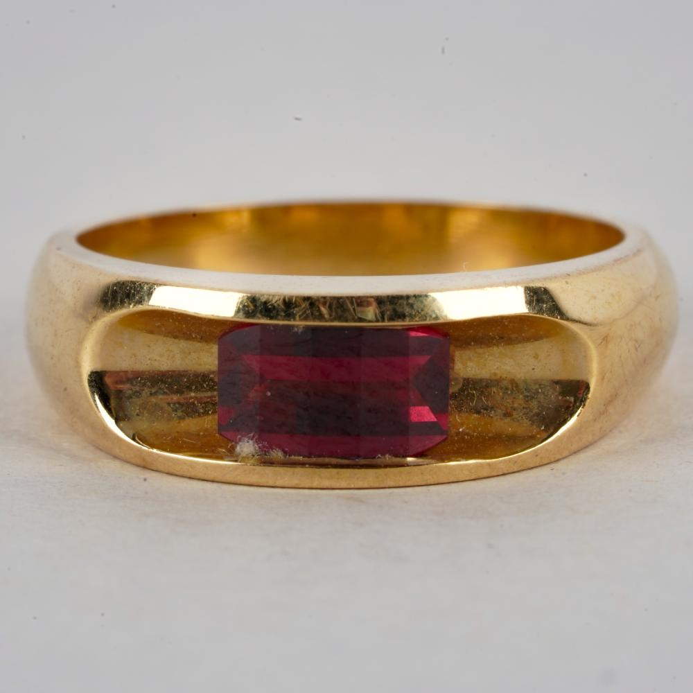 Appraisal: KARAT YELLOW GOLD PINK TOURMALINE RINGcentering one cut-corner rectangular pink