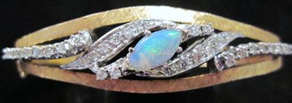 Appraisal: karat yellow gold opal and diamond bracelet Marquise shaped opal