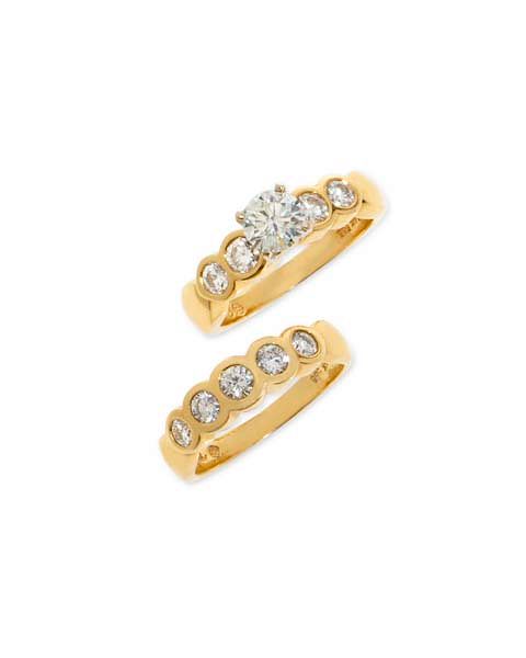 Appraisal: A diamond and fourteen karat gold bridal set A diamond